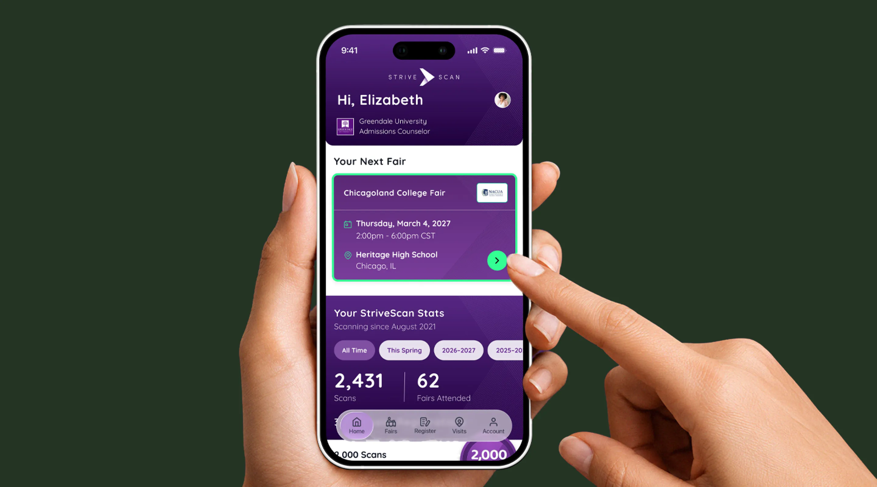 Hand holding a phone running the StriveScan home screen